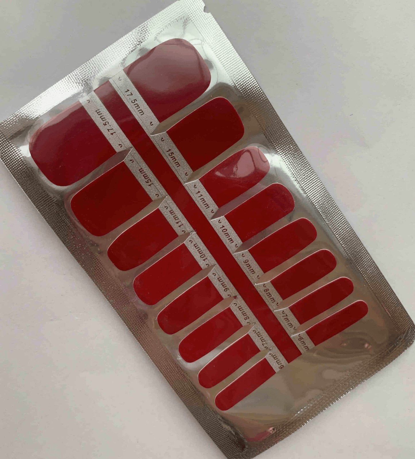 Red and pink non-UV pedicure nail wraps sheet with multiple sizes
