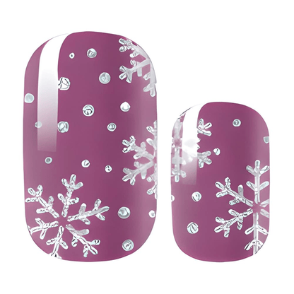 Purple nail wraps with white snowflake and dot pattern Christmas design closeup