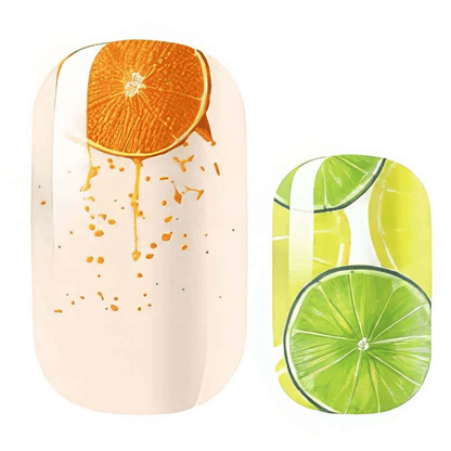 Orange and lime citrus nail wraps showing fruit slice designs on individual nail shapes