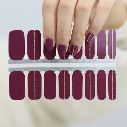 Burgundy nail wrap strips showing deep red solid colour gel nail wraps for manicure