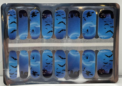 Non-UV nail wraps sheet featuring blue gradient design with black bat Halloween patterns