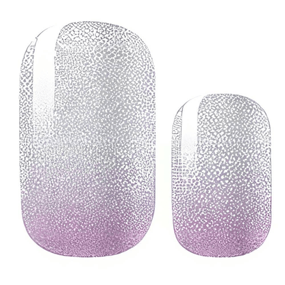 Lilac sparkly ombre nail wraps close-up showing glitter gradient from clear to purple