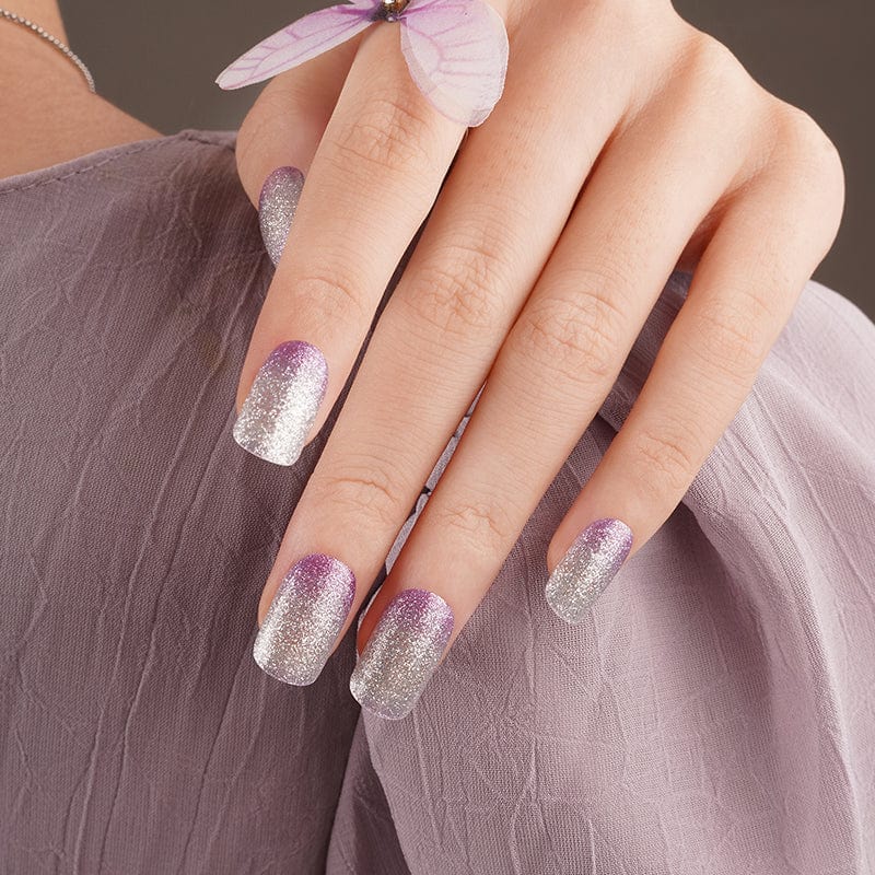 Purple gradient glitter nail wraps manicure with butterfly detail sparkle finish