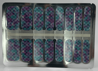 Sheet of iridescent mermaid scale nail wraps in blue purple holographic pattern