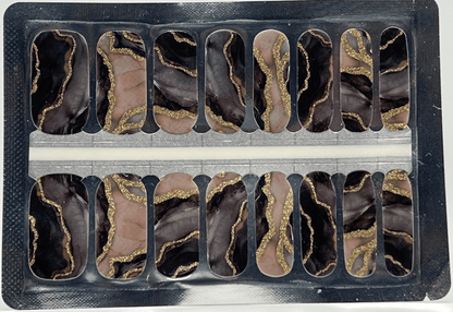 Metamorphic marble nail wraps sheet showing black and rose gold stone pattern designs