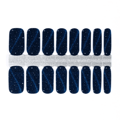 Dark blue gel nail wraps with star glitter pattern cosmic design