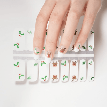 Christmas nail wraps sheet with reindeer and mistletoe patterns for holiday manicure