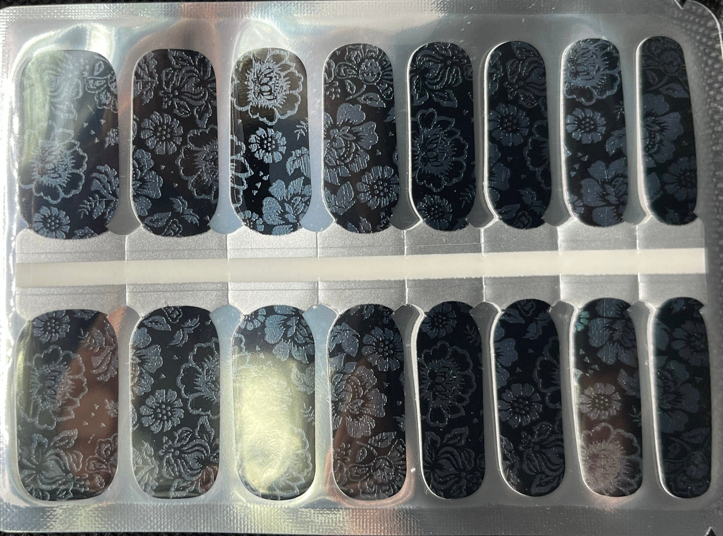 Black and grey floral pattern nail wraps with botanical designs for gothic nail art