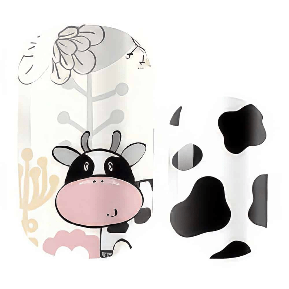 Cartoon cow nail wrap design sheet showing cute pink and black farm animal illustration