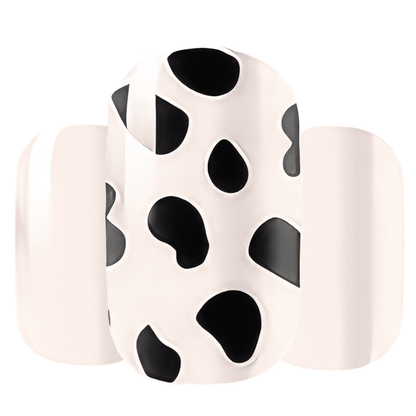 Cow print nail wraps sheet showing black spotted pattern on white background for DIY manicure