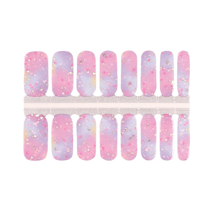 Pink purple gradient glitter nail wrap sheet showing cosmic ombre nail art designs
