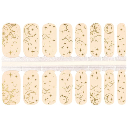 Non-UV nail wraps sheet with celestial gold moon star patterns on nude background