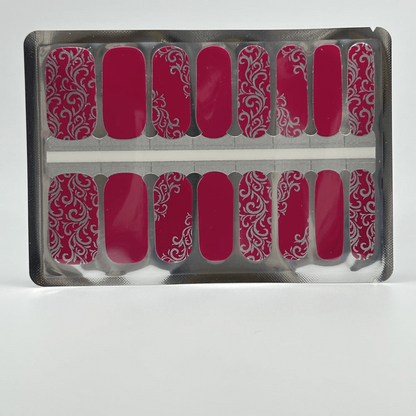Purple nail wraps with silver baroque design in clear packaging sheet