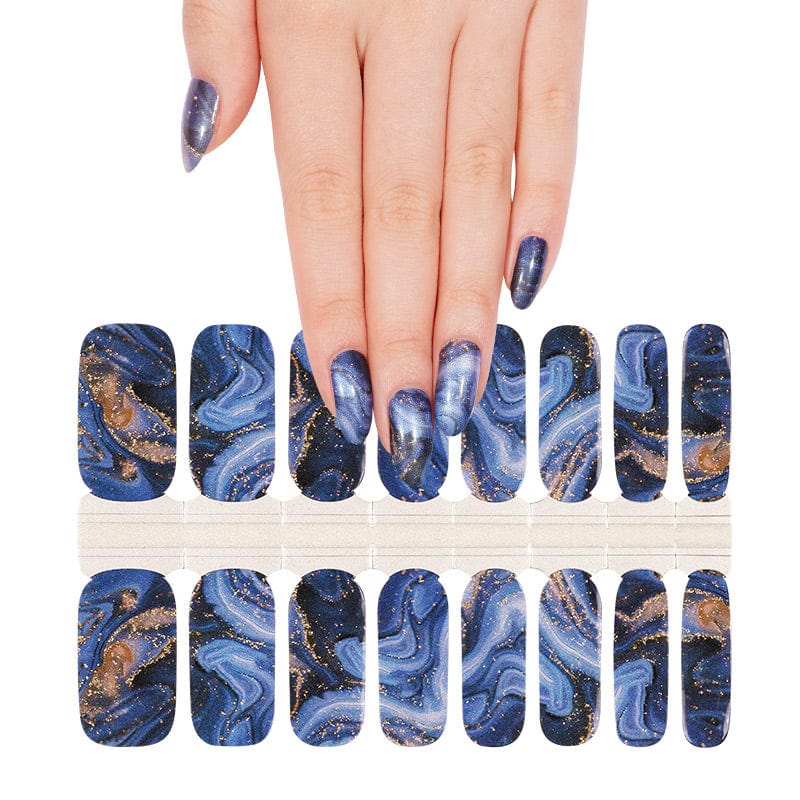 Navy blue marble gel nail wraps sheet with metallic copper veins and abstract patterns