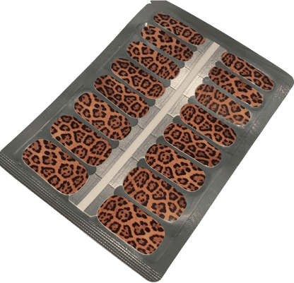 Sheet of leopard print nail wraps in brown and black animal pattern