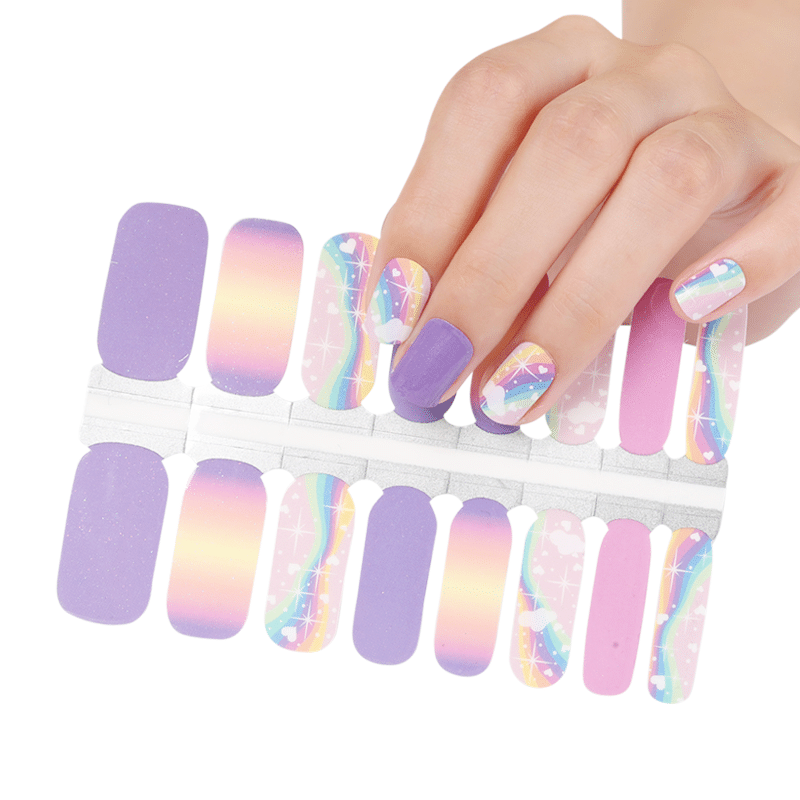 Rainbow gradient nail wraps sheet showing purple pink holographic star stripe patterns for at-home manicure