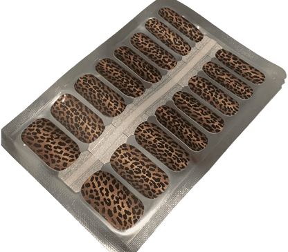 Sheet of leopard print nail wraps showing brown and black animal pattern design
