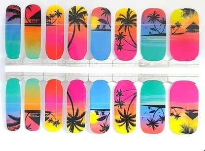 Tropical gradient nail wraps sheet featuring palm tree silhouettes in sunset colours