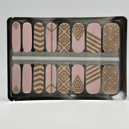 Pink and gold geometric nail wraps sheet showing chevron diamond patterns for at-home manicure