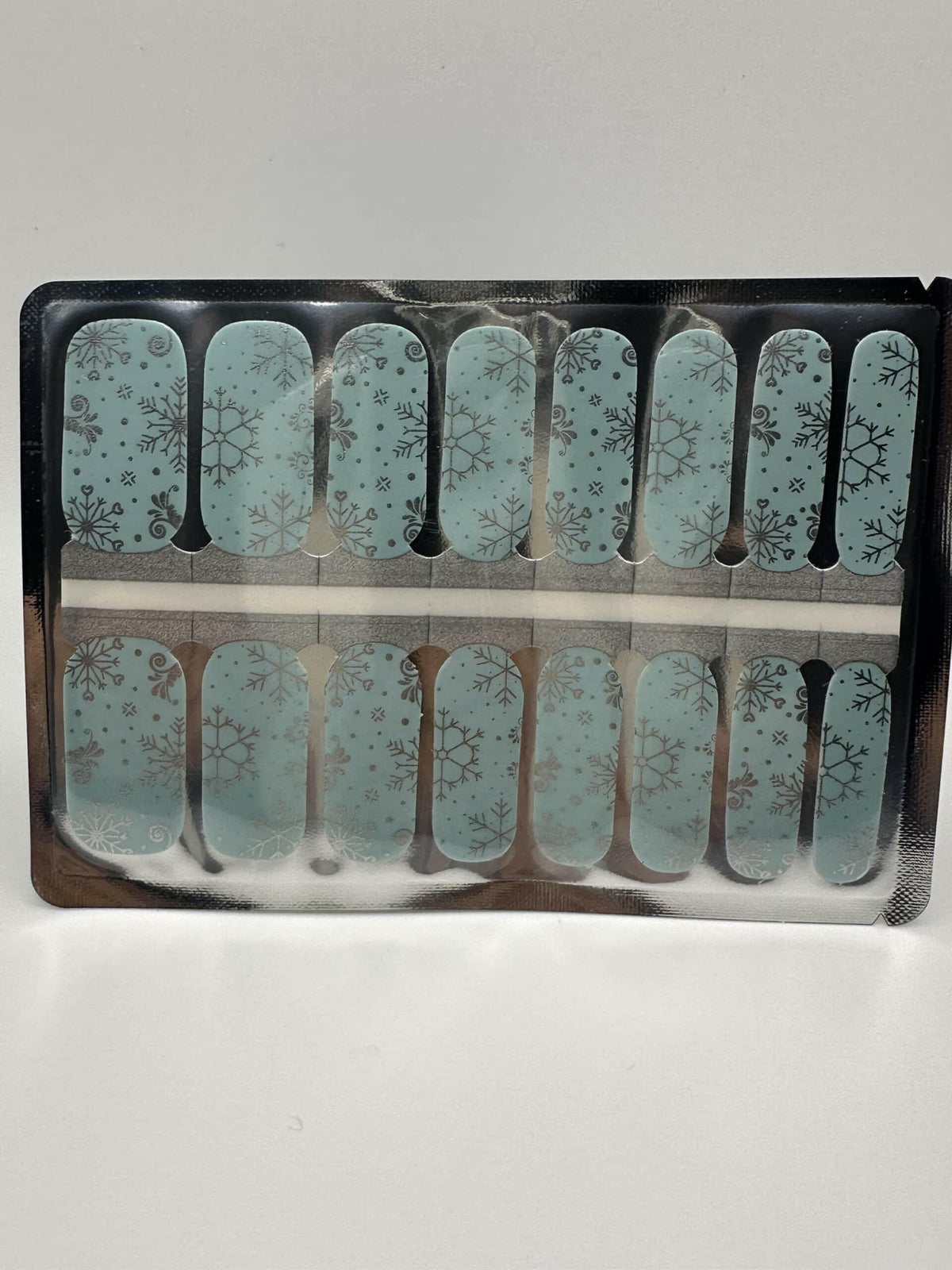 Ice blue snowflake nail wraps sheet with winter pattern for DIY manicure