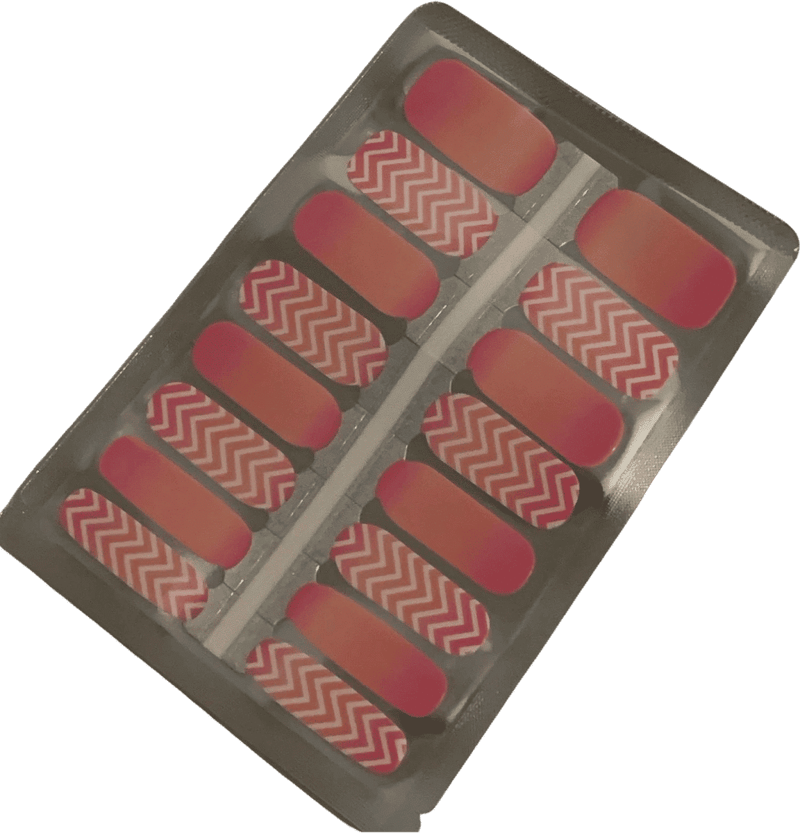 Non-UV nail wraps sheet featuring coral pink chevron pattern and solid ombre designs