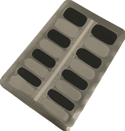 Black and grey non-UV nail wraps sheet showing alternating monochrome gel nail strips