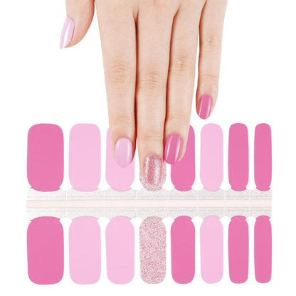 Pink nail wraps with rose gold glitter accent strip for at-home manicure