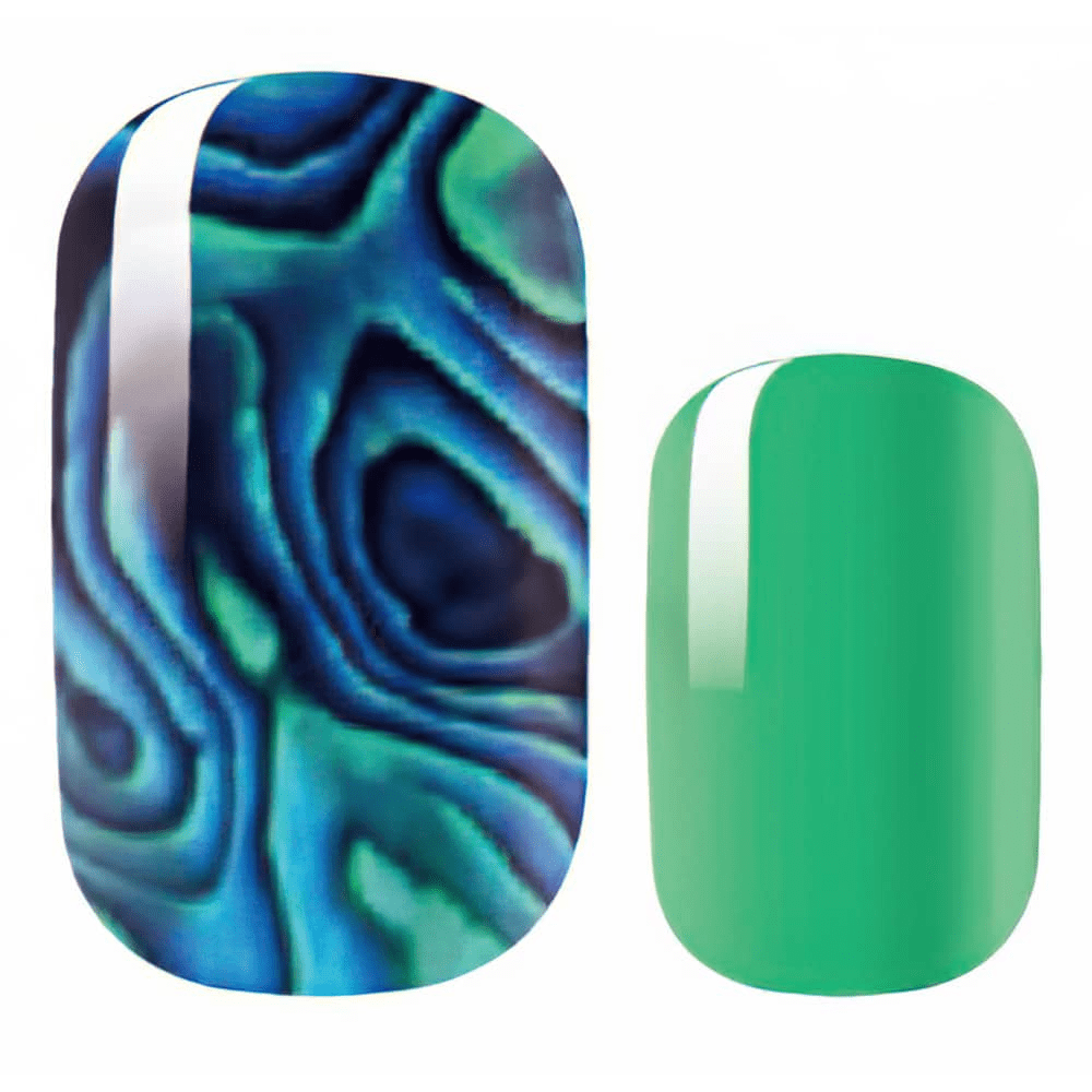 Blue marble nail wraps with swirl pattern and solid green nail design