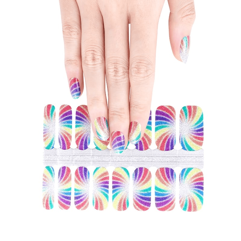Hand selecting rainbow swirl non-UV nail wraps from sheet showing vibrant psychedelic pattern design
