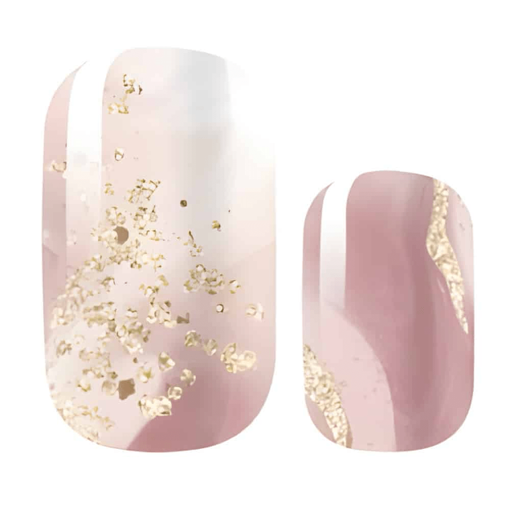 Rose gold foil gel nail wraps with gold flakes on dusty pink base