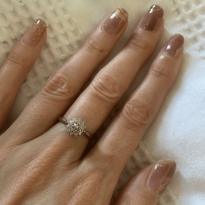 Dusty rose nail wraps with gold foil marble pattern on elegant manicure
