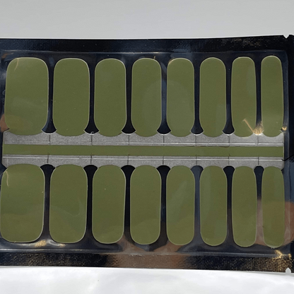 Sheet of sage green non-UV nail wraps showing multiple sizes for DIY manicure