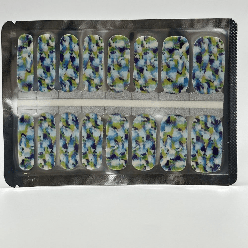 Blue and lime green watercolour floral nail wraps in packaging with abstract botanical pattern