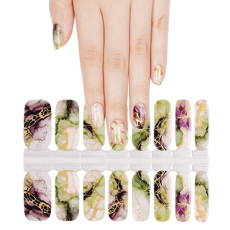 Marble stone nail wraps in sage green mauve colours displayed above hand showing natural pattern