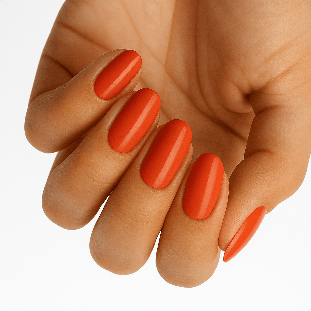 Hand showing burnt orange rust gel nail wraps for autumn at-home manicure