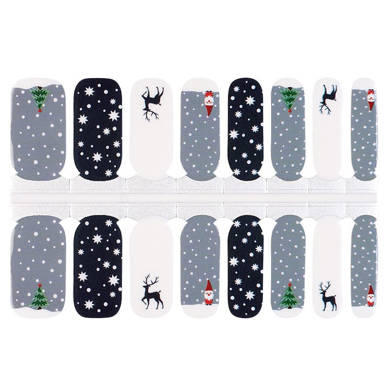 Christmas nail wraps sheet showing festive patterns with snowflakes, reindeer, trees in navy and grey