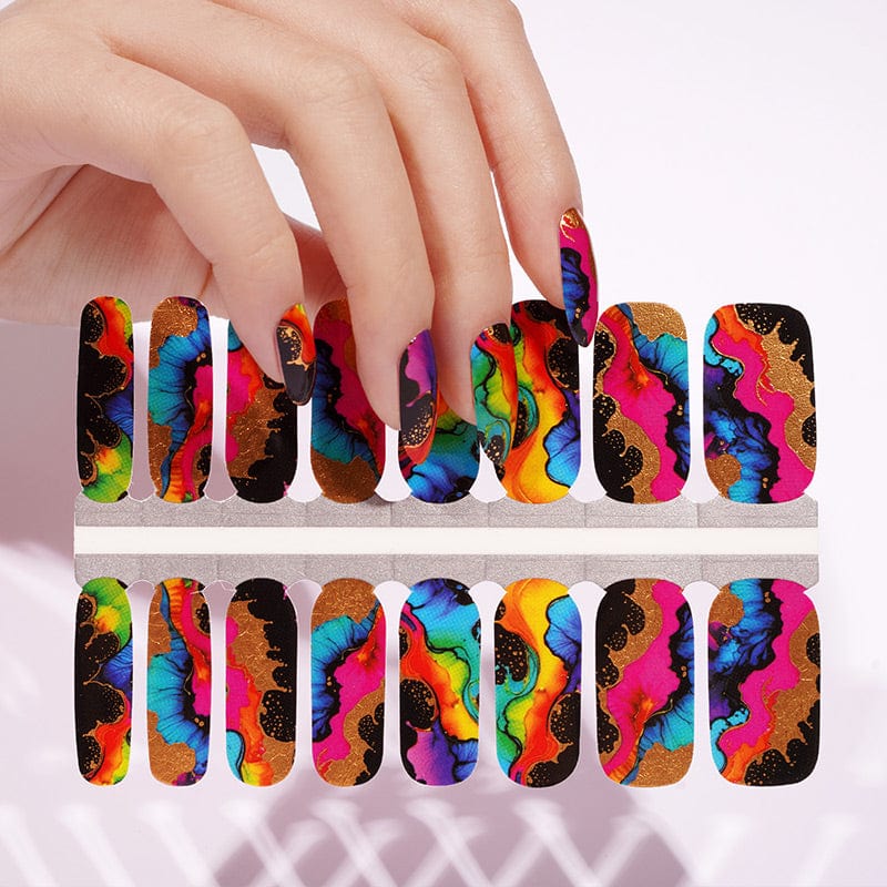 Vibrant multicolour nail wrap sheet showing abstract artistic patterns in neon pink, blue, orange and gold designs