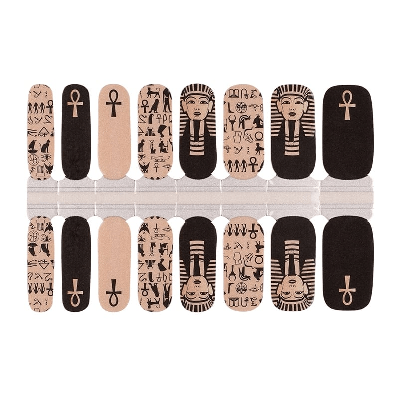 Black and gold Egyptian pharaoh nail wraps with ankh symbols and hieroglyph designs