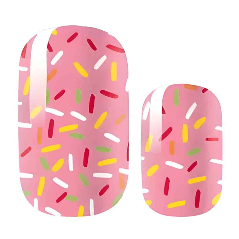 Pink nail wraps with colourful sprinkles pattern for fun birthday party manicure