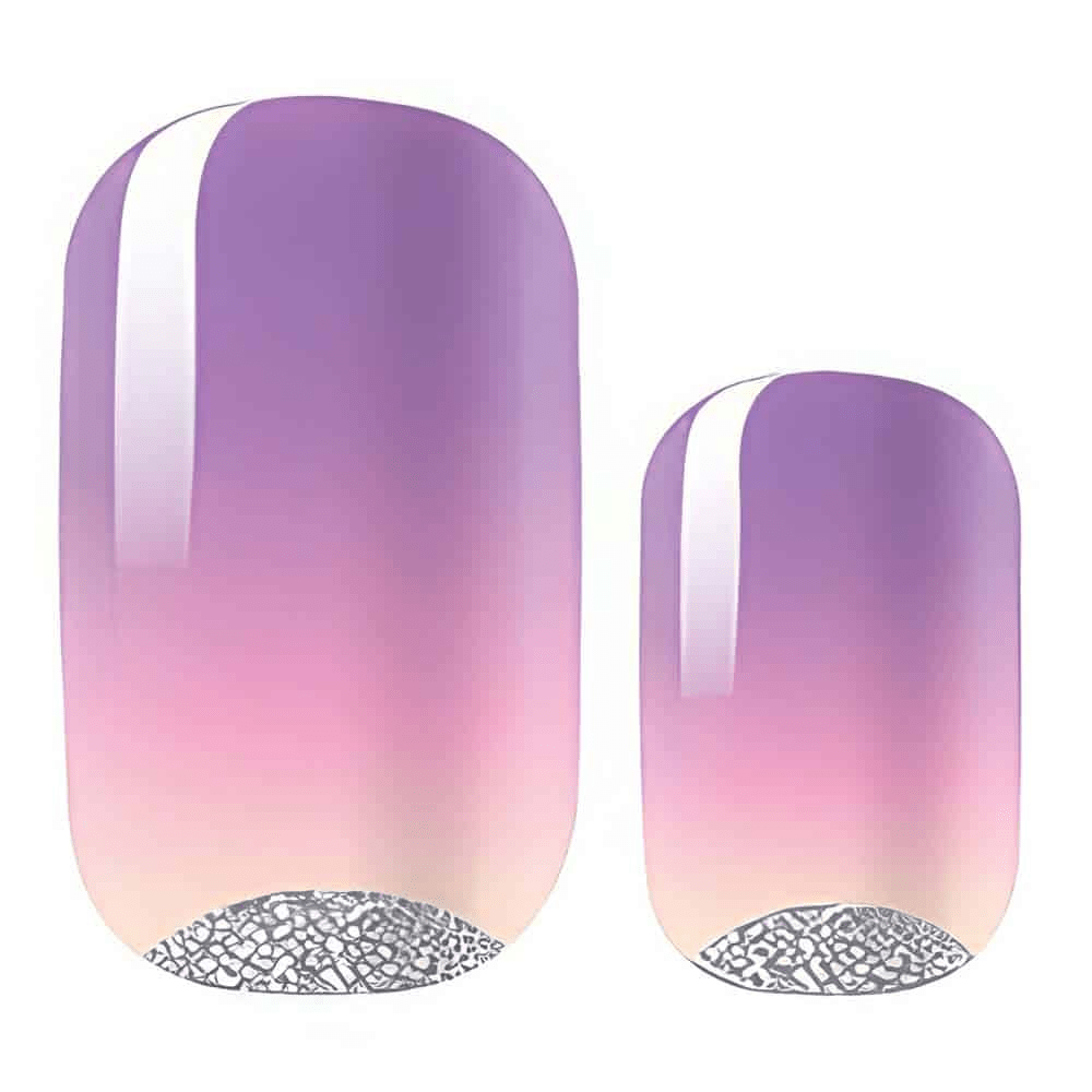 Two purple to pink gradient nail wraps with silver glitter tips close-up