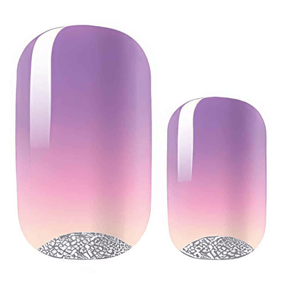 Two purple to pink gradient nail wraps with silver glitter tips close-up
