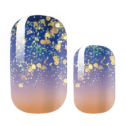 Sunset fireflies gel nail wraps featuring navy to amber gradient with gold glitter confetti