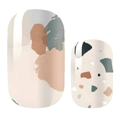 Terrazzo pattern nail wraps showing neutral speckled stone design for at-home manicure