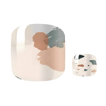 Terrazzo pedicure nail wraps close-up showing neutral speckled stone pattern design