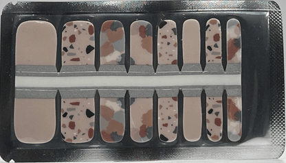 Terrazzo pedicure nail wraps sheet showing speckled stone pattern in neutral earth tones