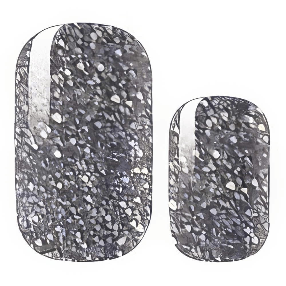 Close-up silver glitter gel nail wraps with reflective metallic chrome texture design