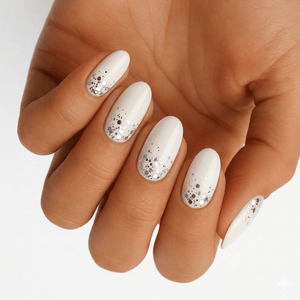 White nail wraps with silver glitter gradient on hand elegant manicure design