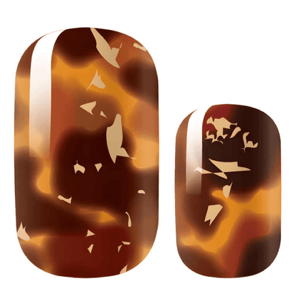 Luxury tortoiseshell nail wraps with gold foil accents in brown pattern