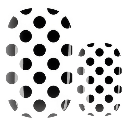 Black and white polka dot nail wraps with classic dotty pattern for at-home manicures