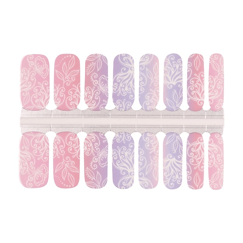 Pink and lavender floral nail wraps sheet displaying botanical lace patterns for at-home manicure